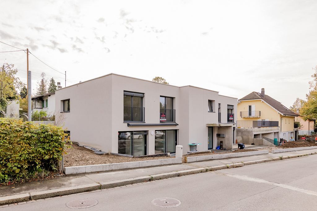 Appartement moderne de 3.5 pièces au 1er étage avec jardin